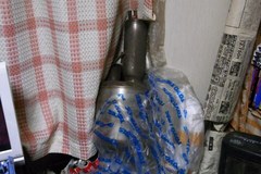 部屋に転がってる無限マフラー.jpg